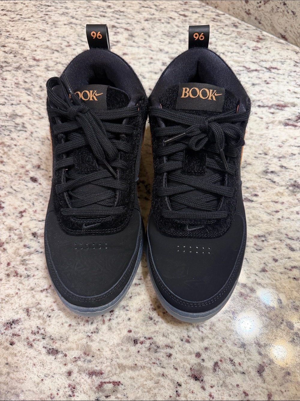 Nike Men’s Black Athletic Shoes with Orange Accents